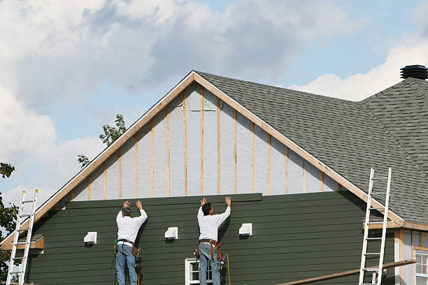 Professional Vinyl Siding technician working in Cairnbrook, PA
